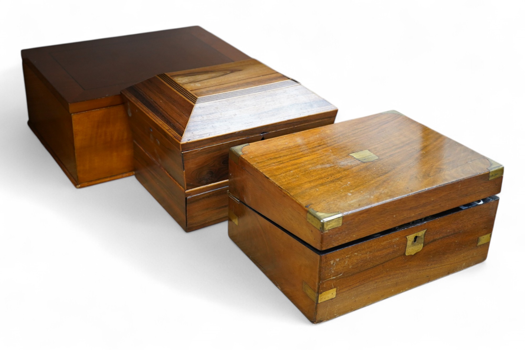 A Regency Gonçalo Alves box, a Victorian walnut writing slope and a modern cherry jewellery casket, tallest jewellery casket 20cm high. Condition - poor to fair